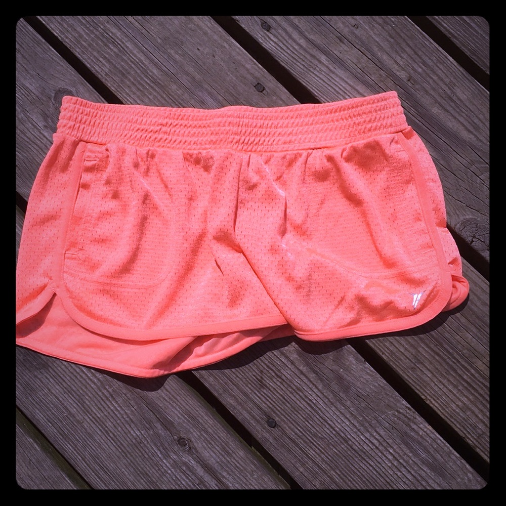 Bright orange jogging short with pockets